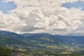 summer mountain landscape with fluffy clouds, image taken in canton of Vaud, Switzerland