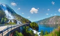 Summer mountain Langfossen waterfall on slope Etne, Norway Royalty Free Stock Photo