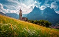 Summer mountain scenery in Dolomites. Wonderful sunny landscape. San Valentino Church in Castelrotto. Kastelruth village. Dolomite Royalty Free Stock Photo
