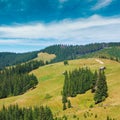 Summer mountain village landscape with hamlet on hill top (Carpathian, Ukraine Royalty Free Stock Photo