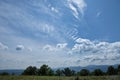 Summer mountains green grass and blue sky with clouds. Royalty Free Stock Photo