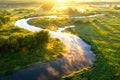 Summer nature background. Scenic sunny river at sunrise view from above. Beautiful bright nature landscape of riverside aerial