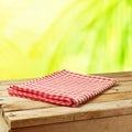 Summer nature background with wooden table and tablecloth Royalty Free Stock Photo