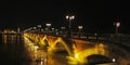 Summer night bridge pont de pierre crossing Garonne river in Bordeaux city france Royalty Free Stock Photo