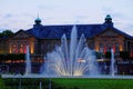 Summer night festivities at historic building with huge fountain in German spa town Royalty Free Stock Photo