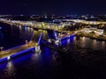 Summer night, Saint Petersburg, Russia. Neva River. A ship passes under drawn bascule moveable Palace bridge. Winter Palace. Royalty Free Stock Photo