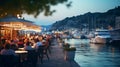 summer night in Yacht harbor blurred sea and city light reflection people silhouette relax in cafe on promenade