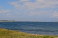 Summer in Nova Scotia: Looking North to Rochefort Point, Louisbourg Lighthouse, Battery, Rocky and Green Islands from Blackrock Pt Royalty Free Stock Photo