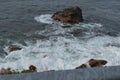 Summer in Nova Scotia: Surf From Broken Wave Along Rocky Shore Near Ingonish on Cape Breton Island Royalty Free Stock Photo