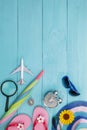 Summer objects of beautiful summer accessory on blue wooden background