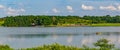 Summer in Omaha, Panorama of boat ramp, parking lt and Pier on the Southern shore of the lake at Ed Zorinsky Lake Park Omaha NE Royalty Free Stock Photo