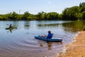 Summer in Omaha, Beach, Kayaks on the lake at Ed Zorinsky lake park, Omaha, Nebraska, USA