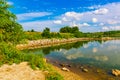 Summer in Omaha, Panorama Shoreline and sky reflections in the lake at Ed Zorinsky Lake Park Omaha NE