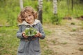 Summer outdoor activity for kids - scavenger hunt, leaves sorting in egg box Royalty Free Stock Photo