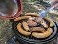 Summer outdoor BBQ meat and hotdogs Royalty Free Stock Photo