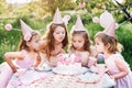 Summer outdoor kids birthday party. Group of happy Children celebrating birthday in park Royalty Free Stock Photo