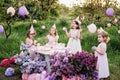 Summer outdoor kids birthday party. Group of happy Children celebrating birthday in park Royalty Free Stock Photo