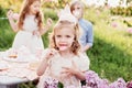 Summer outdoor kids birthday party. Group of happy Children celebrating birthday in park Royalty Free Stock Photo