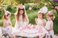 Summer outdoor kids birthday party. Group of happy Children celebrating birthday in park Royalty Free Stock Photo