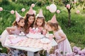 Summer outdoor kids birthday party. Group of happy Children celebrating birthday in park. Royalty Free Stock Photo