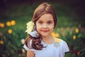 Summer outdoor portrait of adorable smiling kid girl