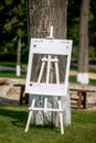 Summer outdoor wedding ceremony decoration. Photo frame for guests, social networks concep, vertical view Royalty Free Stock Photo