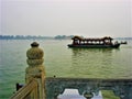 The Summer Palace lake in Beijing, China. Boat, water, balcony and traditional atmosphere Royalty Free Stock Photo