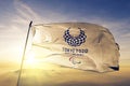 2020 Summer Paralympics Emblem flag textile cloth fabric waving on the top sunrise mist fog Royalty Free Stock Photo