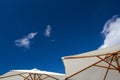 Summer Parasols Under A Blue Sky