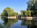 Summer Park. Exquisite stone arch bridge