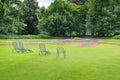 Summer park and green lawns Royalty Free Stock Photo