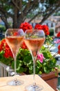 Summer party, drinking of French brut rose champagne sparkling wine in glasses in yacht harbour of Port Grimaud near Saint-Tropez Royalty Free Stock Photo