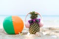 Summer in the party. Hipster Pineapple Fashion in sunglass and listen music Royalty Free Stock Photo
