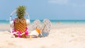 Summer in the party. Hipster Pineapple Fashion in sunglass and listen music with sunblock and sandal on the sand beach Royalty Free Stock Photo