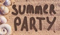 Summer party text drawn on a beach sea sand