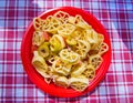 Summer pasta with tomato, tuna, oregano and olives Royalty Free Stock Photo