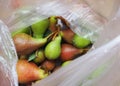 Summer pears in a plastic bag