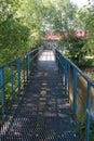 Summer. Pedestrian bridge across the Trubezh River. Royalty Free Stock Photo