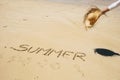 Summer people travel holiday vacation concept with young caucasian beautiful woman at the beach enjoying the sun with the word Royalty Free Stock Photo