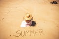 Summer people travel holiday vacation concept with young caucasian beautiful woman sit down at the beach enjoying the sun with the Royalty Free Stock Photo