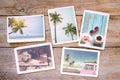 Summer photo album on wood table