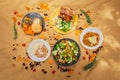 A summer picnic atmosphere, tablecloth on the lawn with plates of healthy food and fruit drinks. Flat lay food. Olive oil, salads Royalty Free Stock Photo