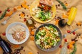 A summer picnic atmosphere, tablecloth on the lawn with plates of healthy food and fruit drinks. Flat lay food. Olive oil, salads Royalty Free Stock Photo