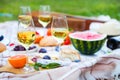 Summer Picnic Basket on the Green Grass. Food and drink concept. Royalty Free Stock Photo