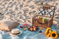 Summer picnic in the beach. Wooden basket with food Royalty Free Stock Photo