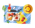 Summer picnic food and drink on blanket sunglasses and hat