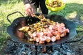 Summer picnic. Preparation of delicious sausages