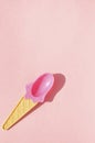 Summer pink ice cream spoon on pink background Royalty Free Stock Photo