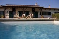 Summer poolside view Royalty Free Stock Photo