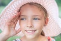 Summer portrait of a beautiful girl in a pink hat. Royalty Free Stock Photo